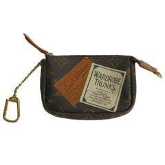 LOUIS VUITTON Mini Pouch 'Wardrobe Trunk' in Brown monogram Canvas