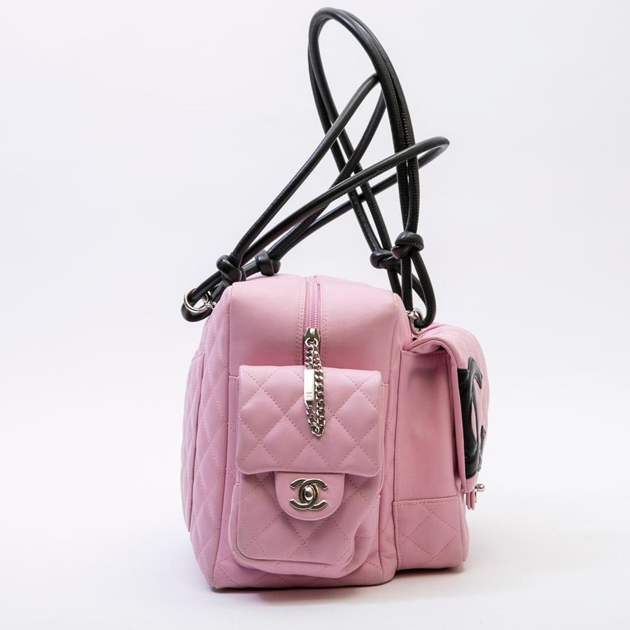 Large Chanel 'Cambon' Reporter bag in pink quilted smooth lambskin. Silver metal hardware. 

Zip closure. Monogram black canvas lining with several pockets including one zipped.

Made in Italy. 

Included : Hologram: 9672 ..(2004-2005). No