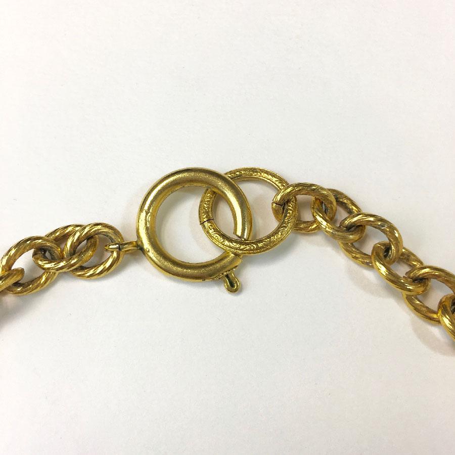 CHANEL Long Necklace in Gilt Metal with Bag and Hat Pendant 1