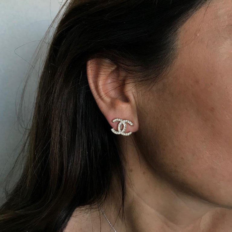 CHANEL CC Stud earrings in Pale Gilt Metal set with Rhinestones at 1stDibs  | chanel stud earrings, chanel studs, chanel studs earrings