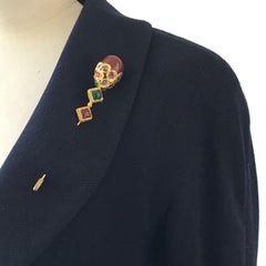 LOEWE Broche vintage en métal doré et verre fondu coloré