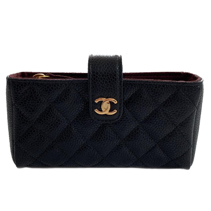 CHANEL Small Quilted Pouch in Black Caviar Leather