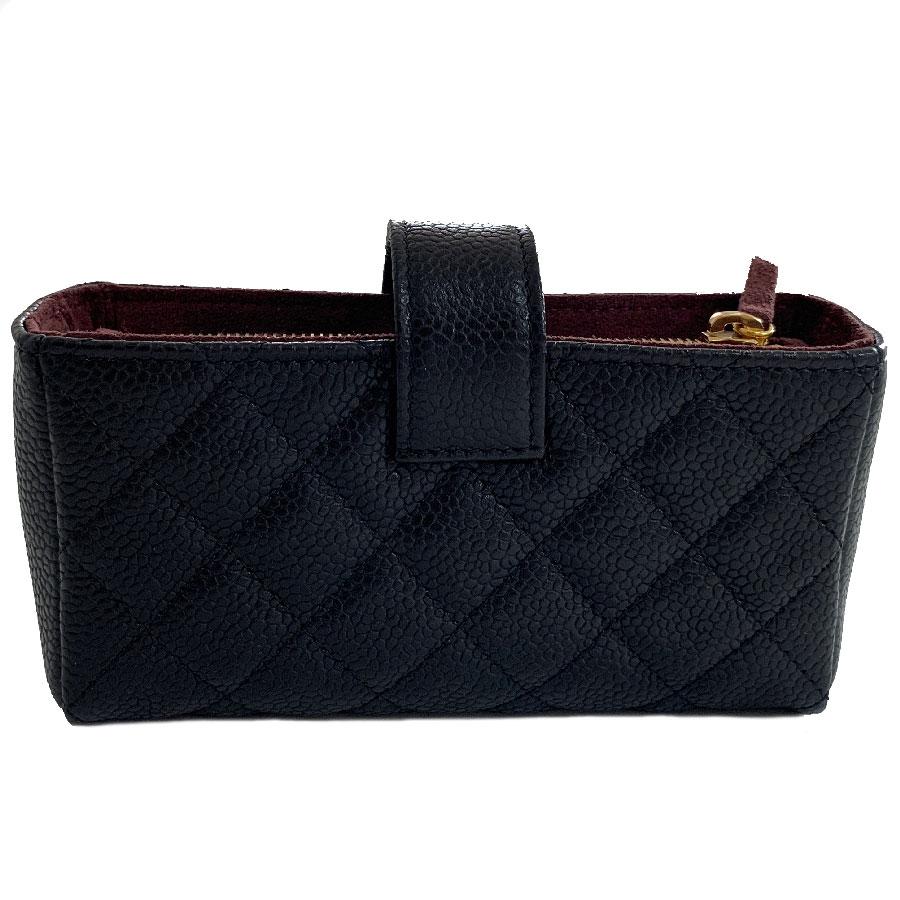 CHANEL Small Quilted Pouch in Black Caviar Leather 2