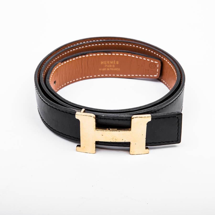 Hermès H reversible belt in black and gold box leather and hardware in gold metal (micro-scratches).  Size 70 FR 
Stamp Q in a square (2013). 
In very good condition. Made in France.

Dimensions: total length 84 cm, at the shortest 64.5 cm, at the