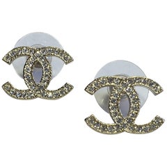 CHANEL CC Stud Earrings in Pale Gilded Metal set with Rhinestones