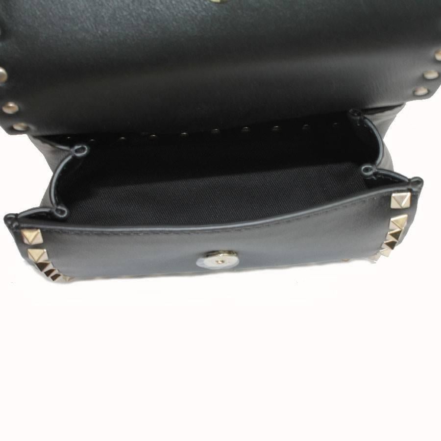 Women's VALENTINO  Rockstud Line Clutch in Black Leather and Gilded Studs