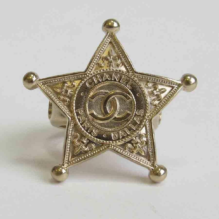 Women's CHANEL Paris Dallas Ring, Sheriff's Star in gilded metal Size 52