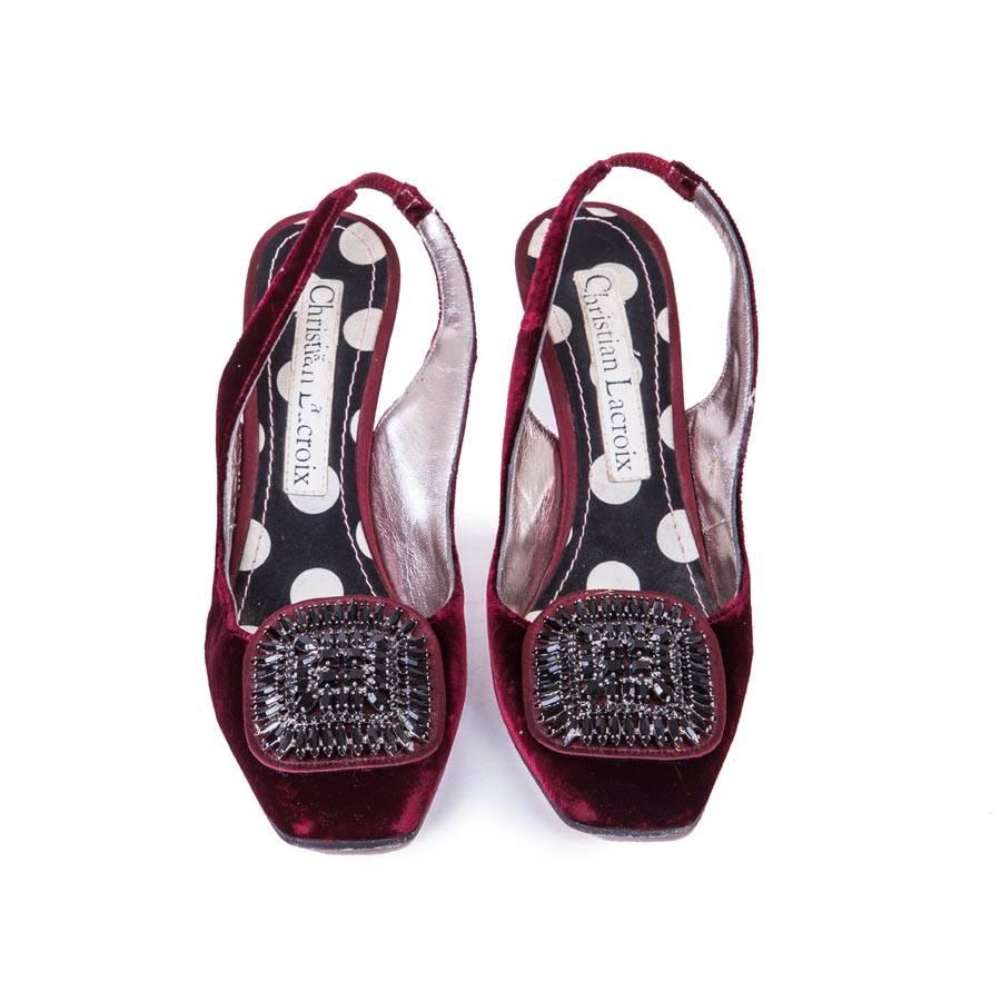 Christian Lacroix high heels sandals in cardinal red velvet. Size 36.5FR 

They have a blackened silver metal jewelry and cut black Swarovski crystals: marquise and square. 

The heel is in silk satin (light scratches). The inner sides are in smooth