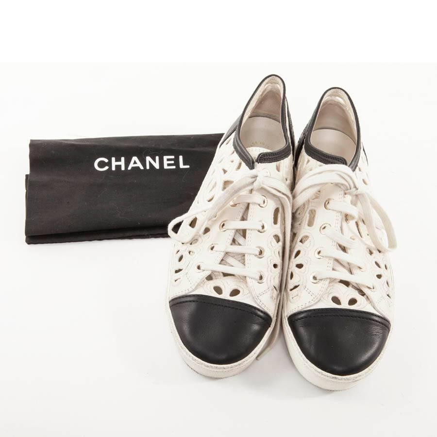 Women's CHANEL Sneakers in White and Black Leather and Embroidery Size 39.5