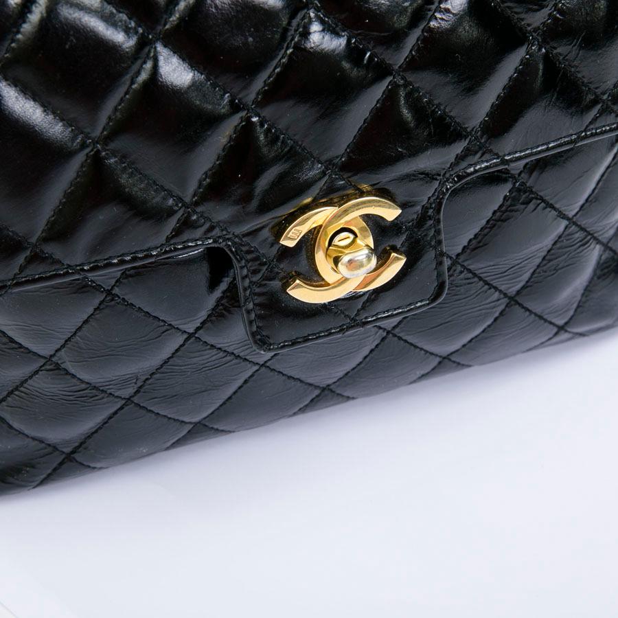CHANEL Vintage Bag in Quilted Semi-Gloss Black Leather 4