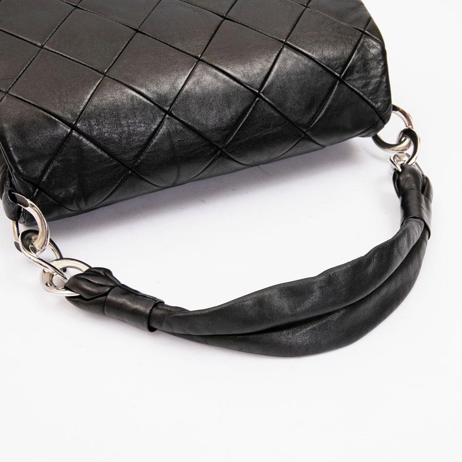 CHANEL Flap Bag in Black Quilted Lambskin Leather 7