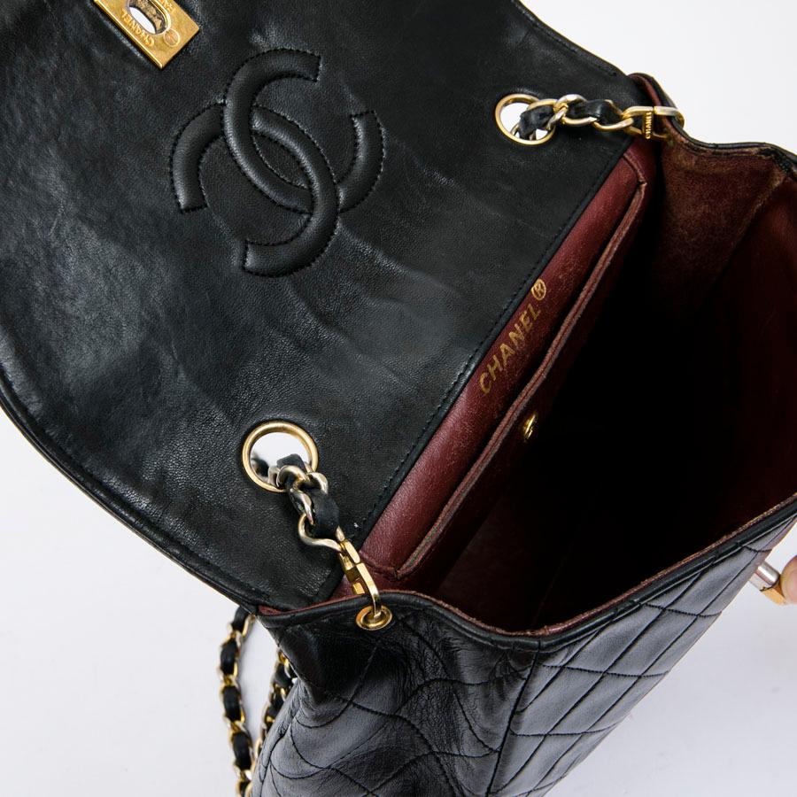 CHANEL Vintage Bag in Black Quilted Leather 4