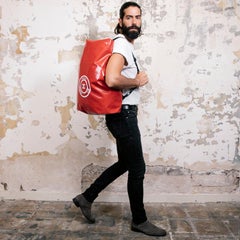 CHANEL Waterproof Red Laminated Canvas Backpack