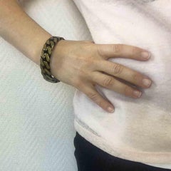 CHANEL Bracelet in Gilt Metal with Black Chain Design