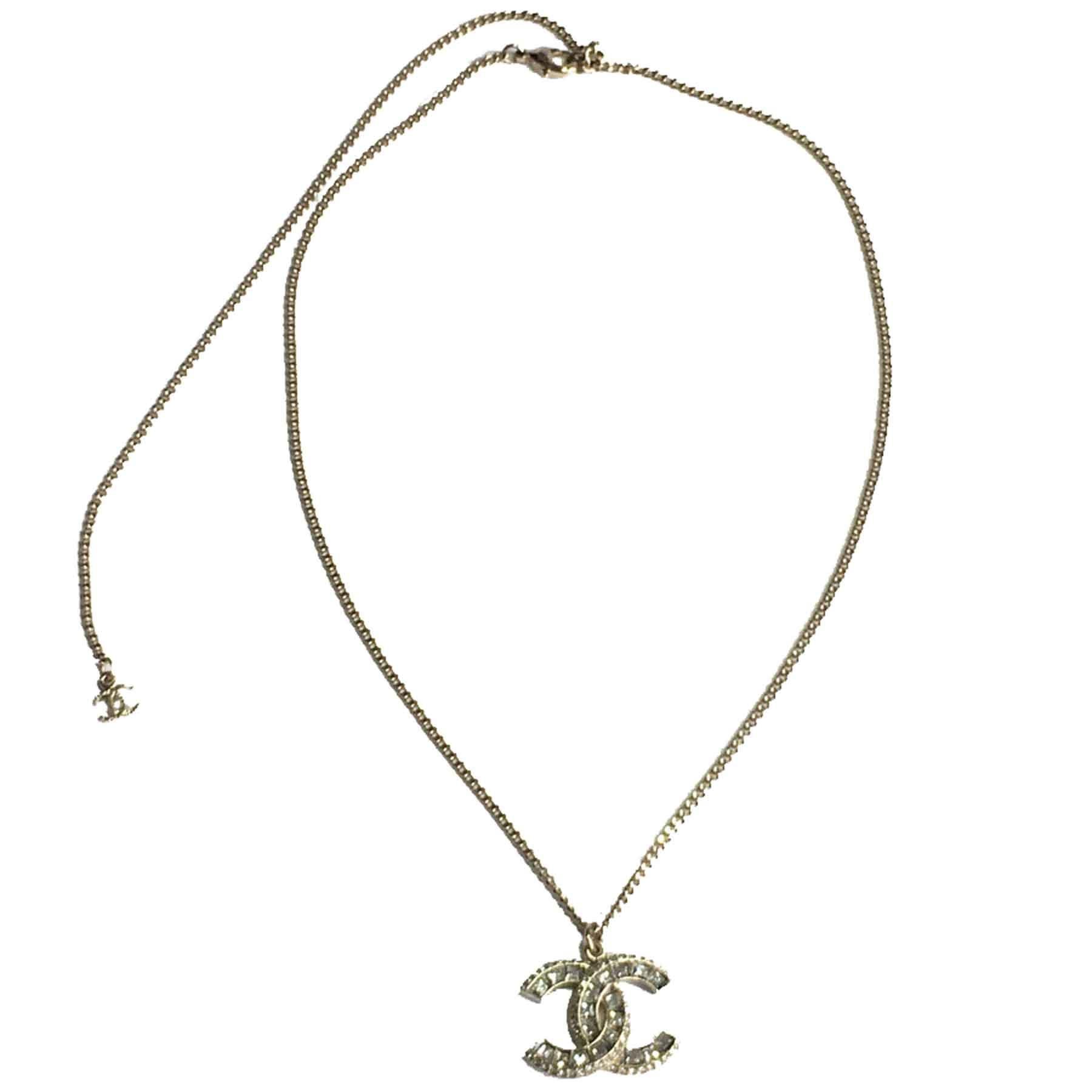 CHANEL CC Pendant Necklace in Gilt Metal and Brilliants