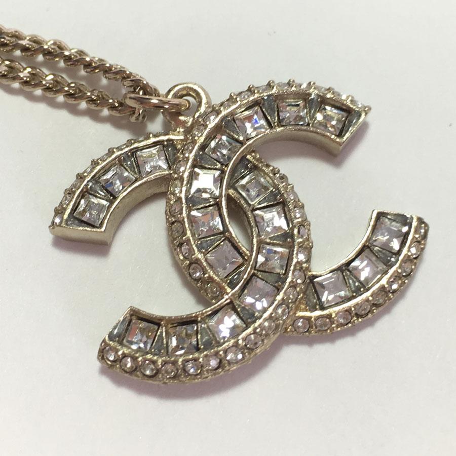 Women's CHANEL CC Pendant Necklace in Gilt Metal and Brilliants