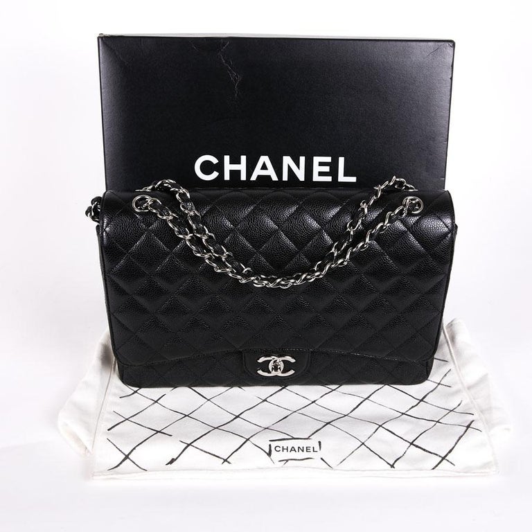 CHANEL Maxi Jumbo Double Flap Bag in Black Caviar Leather at
