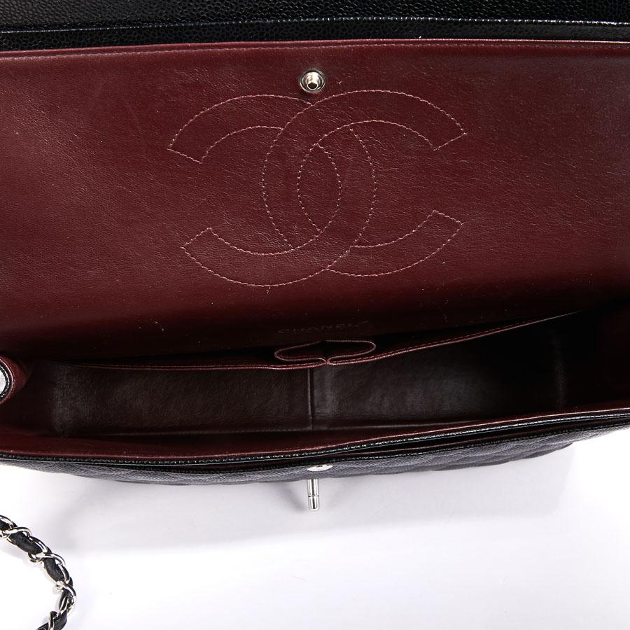 CHANEL Maxi Jumbo Double Flap Bag in Black Caviar Leather 4