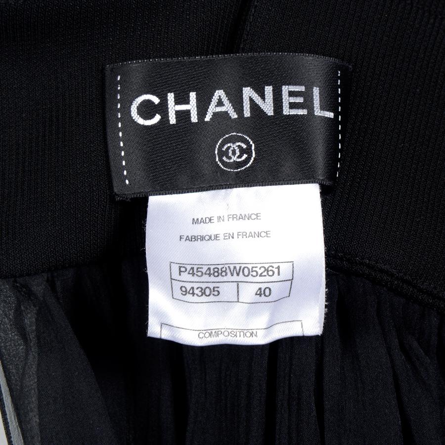 Women's CHANEL Sleeveless Cocktail Dress in Black Chiffon with a Gauzy Effect Size 40FR For Sale