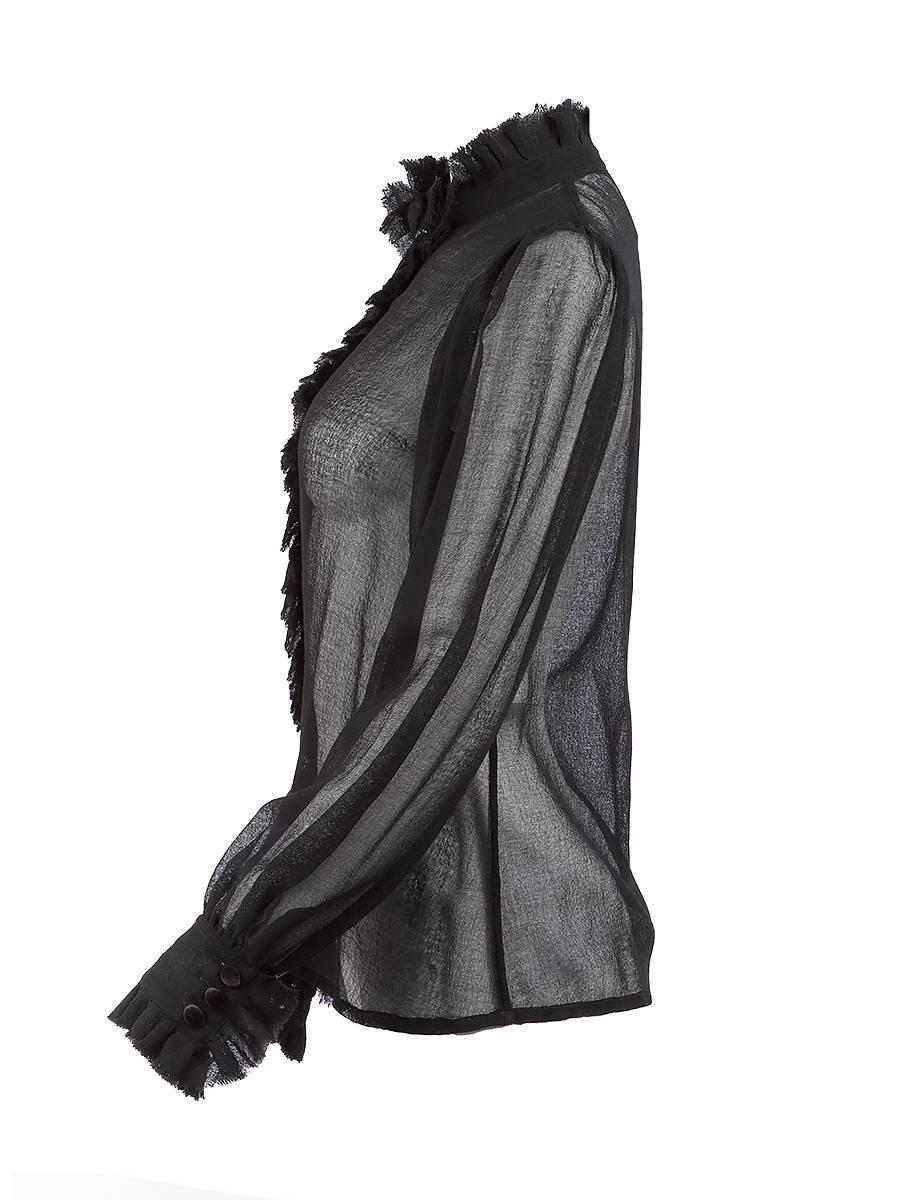 Rare TAO Comme Des Garçons sheer black raw silk blouse featuring a high ruffled neckline, puffed sleeves and ruffling along the front buttons. 
2009 Runway Collection.