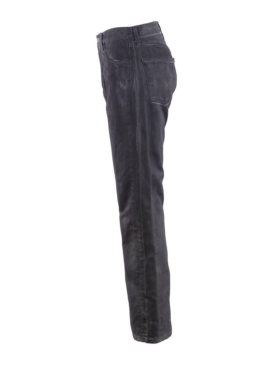 Maison Martin Margiela Artisanal Black Painted Jeans. Straight leg jeans in denim that have been painted black featuring a five pocket design with belt loops, and a button fly fastening. New With Tags.

