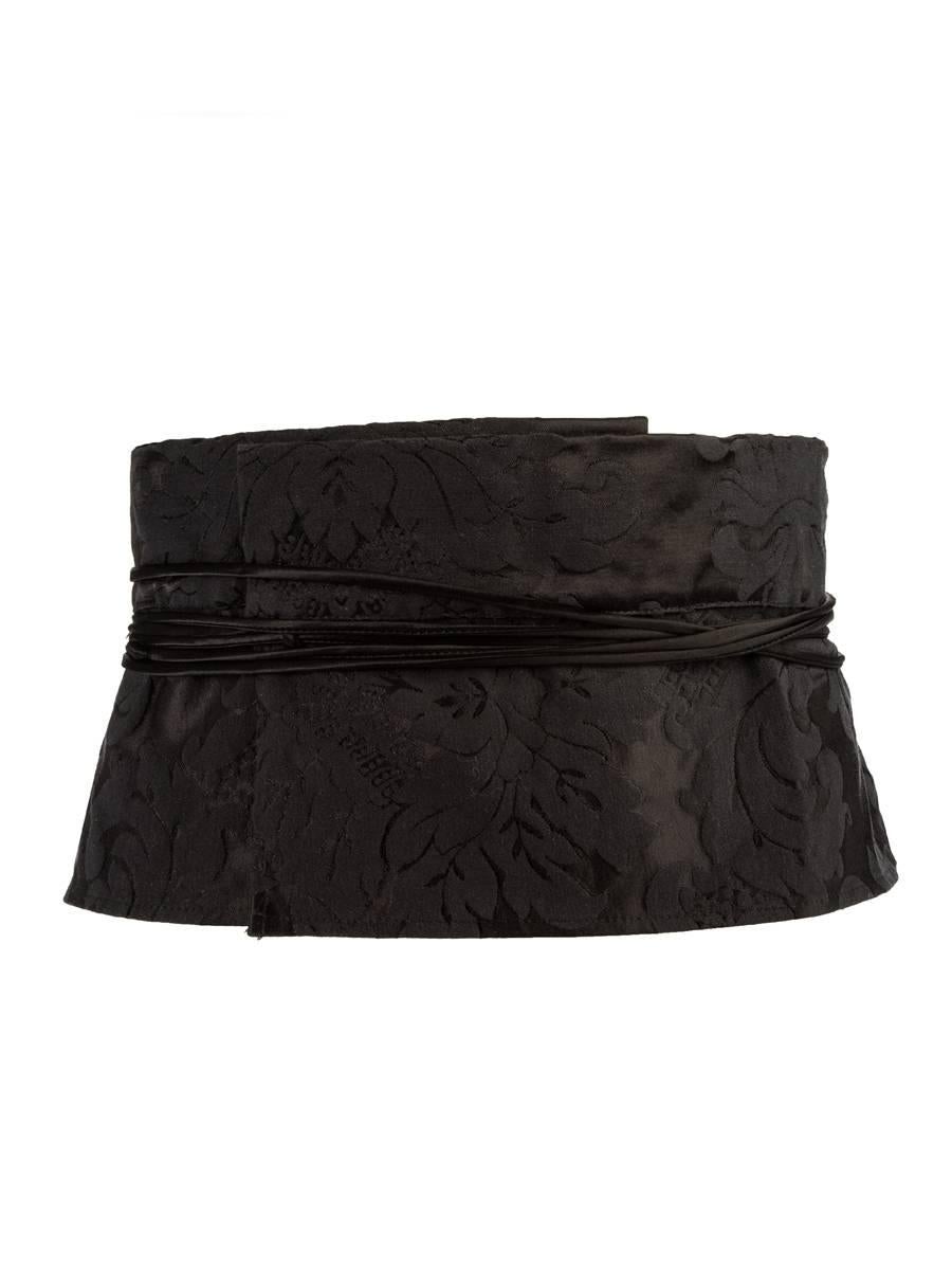 2002 Maison Martin Margiela black brocade fabric wide waist belt with two long self-tying string closures and a back bustle. New in Box with Tag.