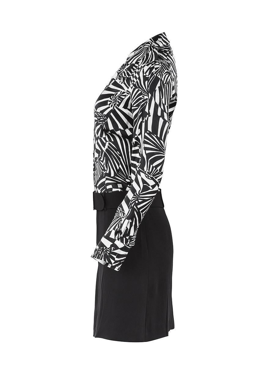 1980's Paco Rabanne black and white silk psychedelic print long sleeve shirt dress with a wool crepe skirt and an attached wide belt. New with Tags.