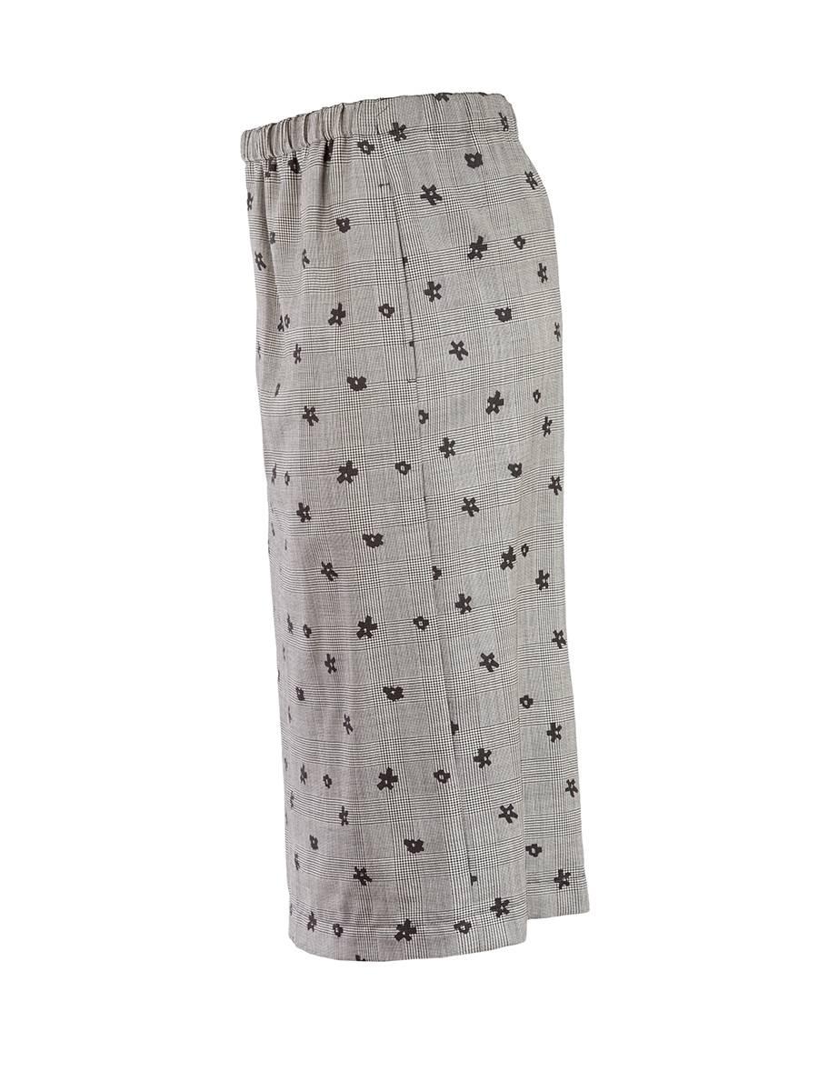 Comme des Garçons 20th Century black and white plaid midi skirt with an elastic waist and scattered small embroidered flowers. New with Tags.