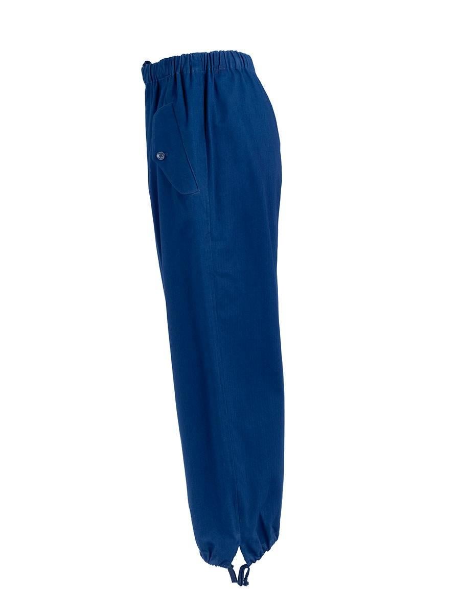 1990's Comme Des Garçons Blue Cotton Drawstring Pants with side flap pockets, elastic waist, and drawstrings at the ankles. New with Tag.