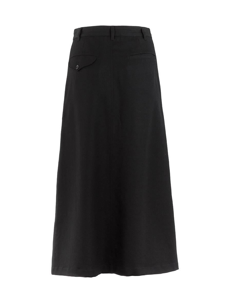 20th Century NWT Comme Des Garçons black wool gabardine full trouser-style maxi skirt with a zip and button closure, slant side pockets and asymmetric back pockets. Size Small.