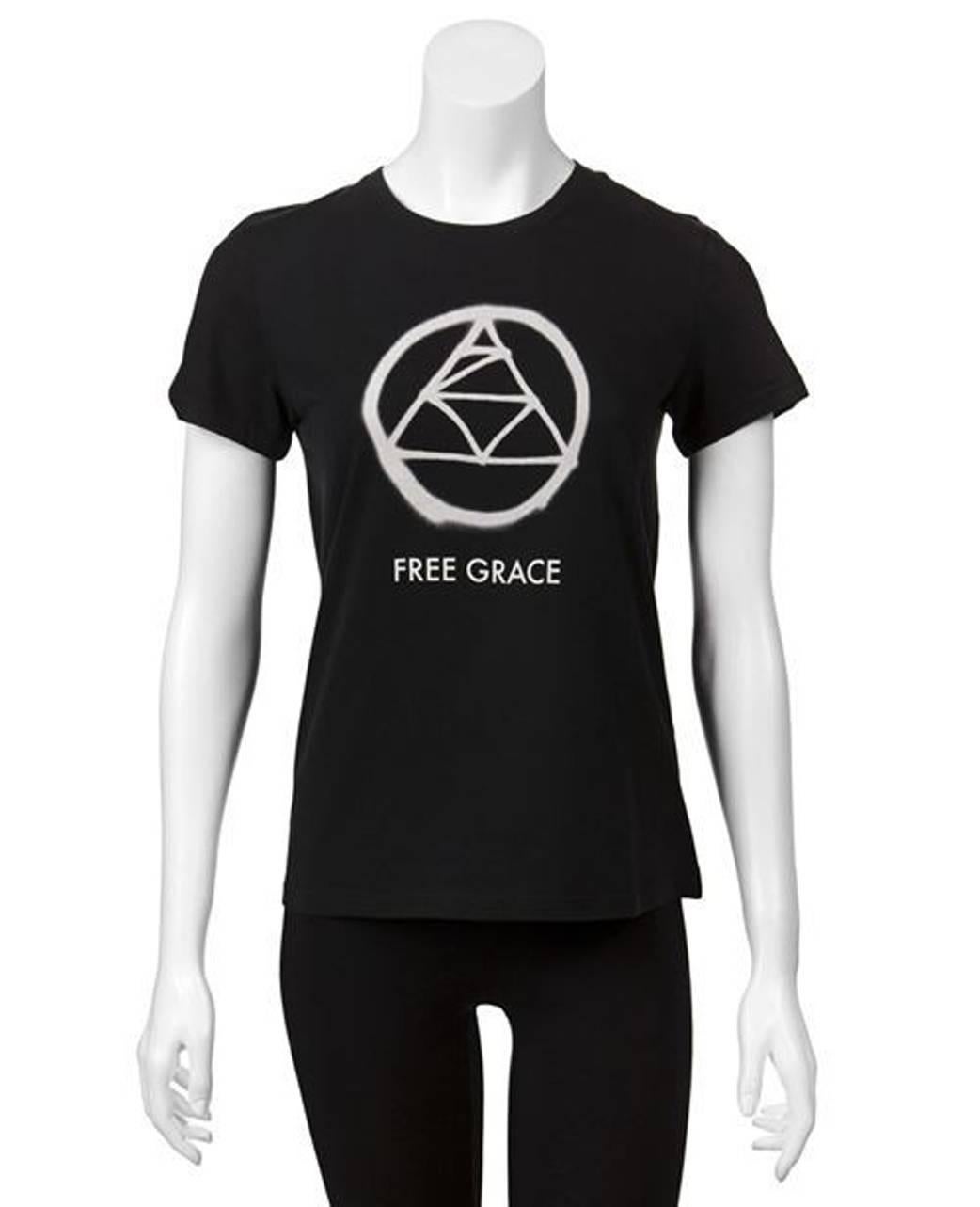 Undercover Clothing 2009 Grace Collection black cotton t-shirt featuring a spray painted graphic and 'Free Grace' printed across the front and spray painted text across the back. New with Tags.