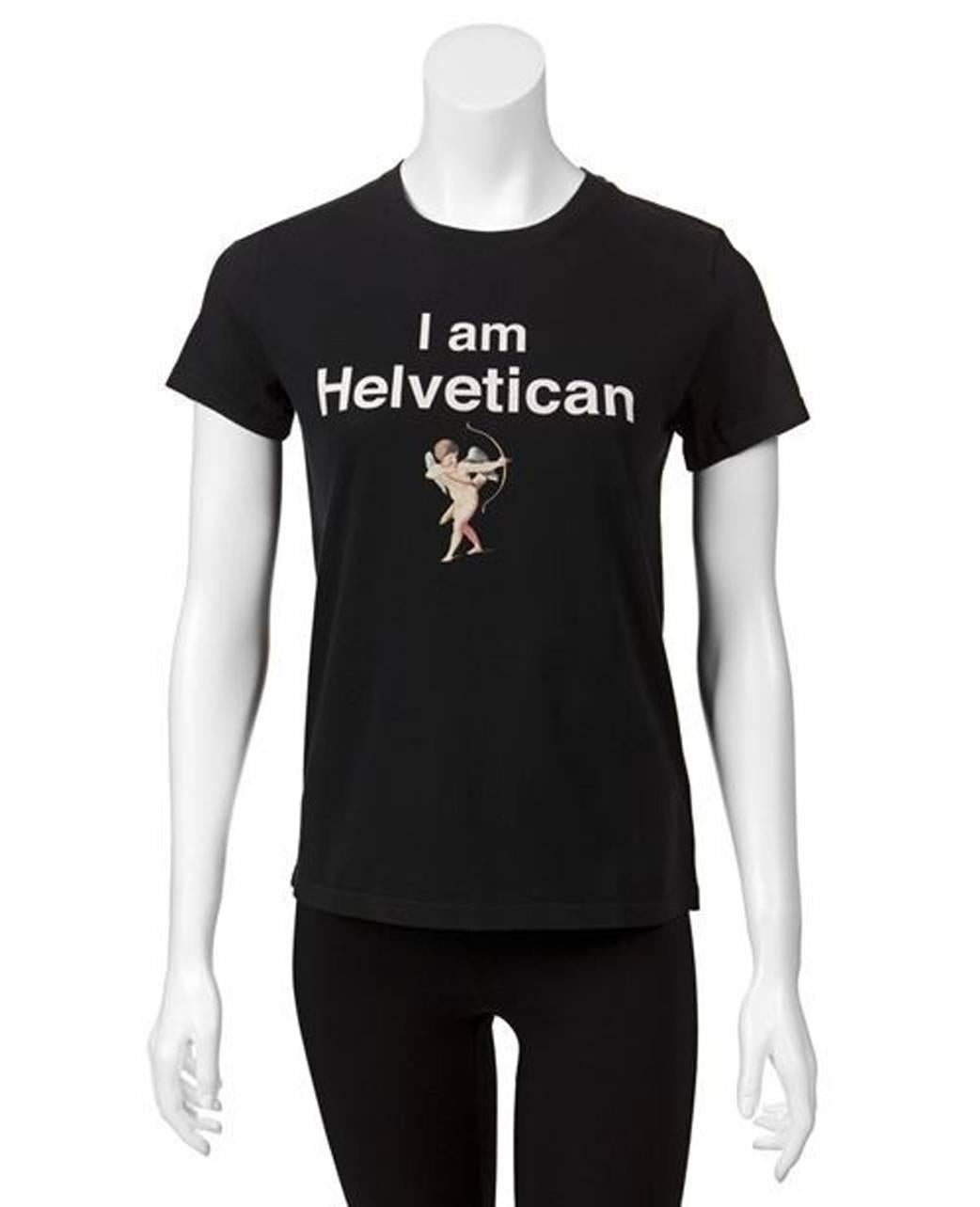 I am Helvetican tee by Undercover. This lightweight tee is made of soft black cotton and has an 