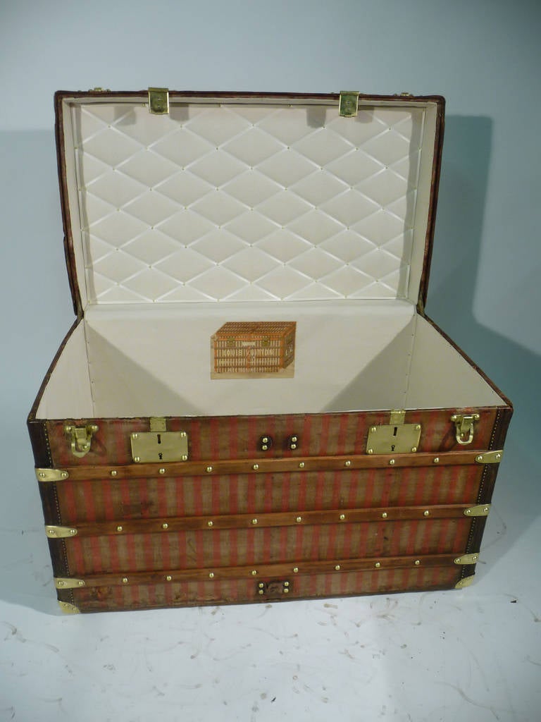 Very rare Louis Vuitton red stripes steamer trunk 
Louis Vuitton canvas products such little time, which is why this type of fabric is very rare. 
-  Leather borders 

- Handles hasp and brass locks. 

- Interior redone like original one