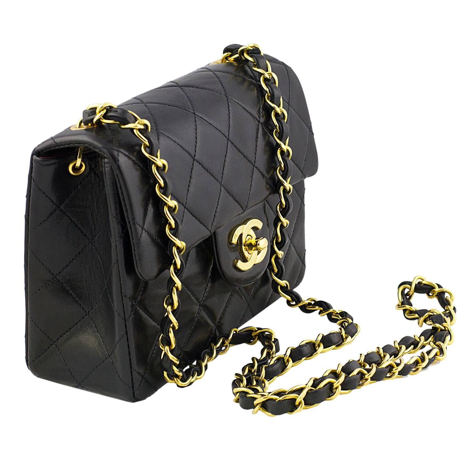 Chanel black lambskin quilted leather mini classic flap bag.
High carat gold plated hardware. 
With serial number in tact and dust bag.
Made in France in 1991