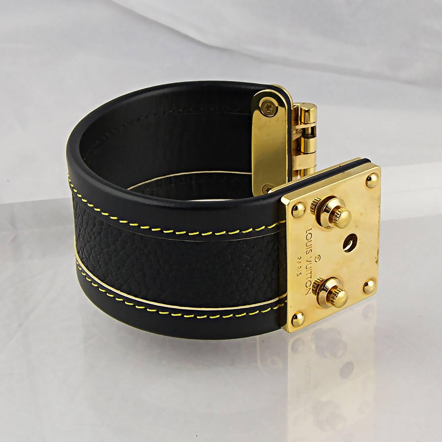 Louis Vuitton Suhali cuff with high carat gold plated detail.
A classic Vuitton leather accessory. 
Made in France in July 2007.
