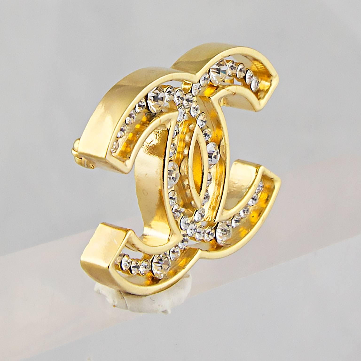 Chanel CC Logo Brooch with Crystal Rhinestones.
Set into high carat gold plated metal.
Made in France for the Autumn 2002 Collection