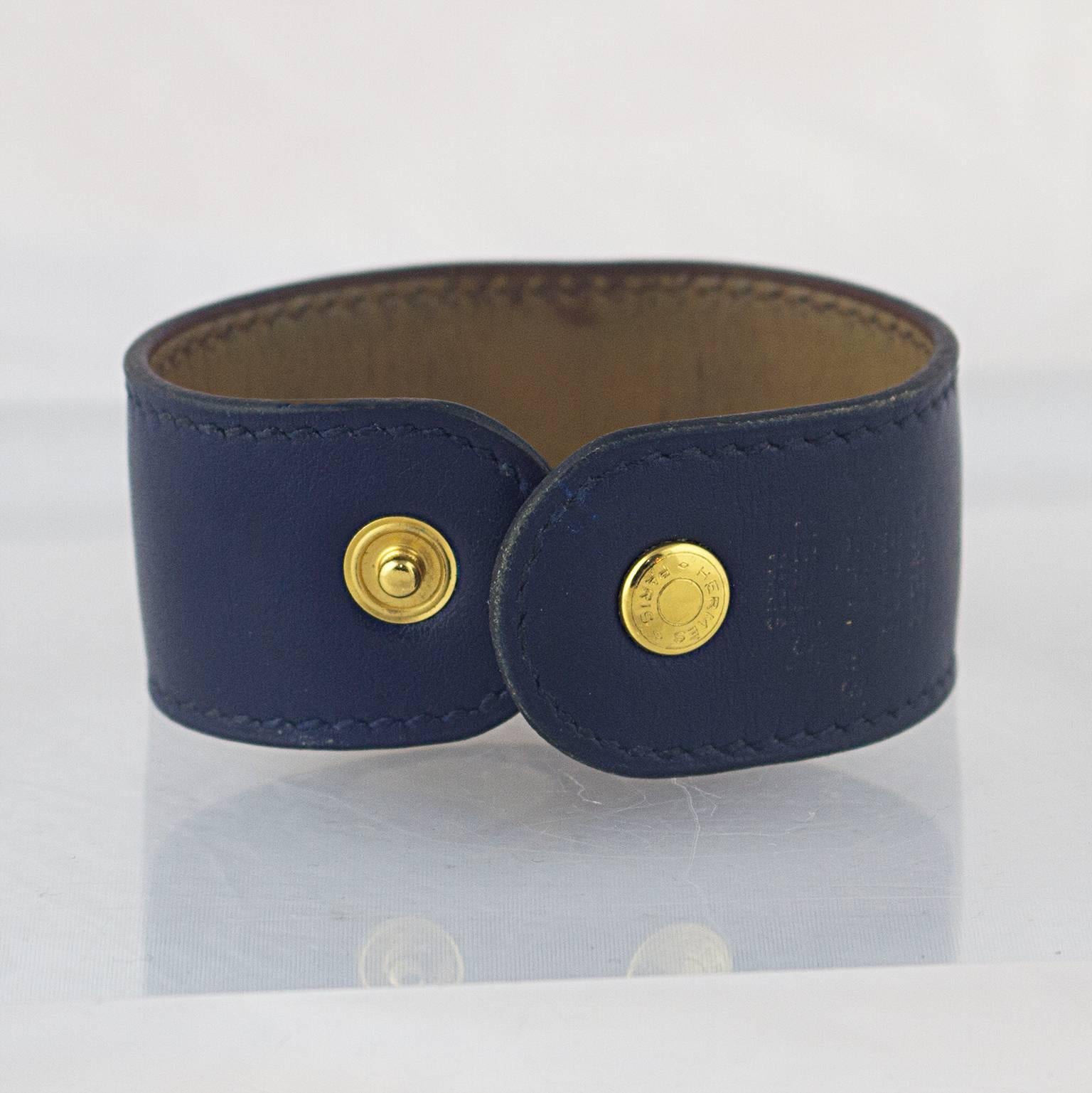 A navy leather box calf leather Hermes Medor bracelet.
A famous and sought after Hermes piece, great to stack with other bracelets and watches. 
Made in September 1993.
In a fair vintage condition. Some rubbing to the leather consistent with age and