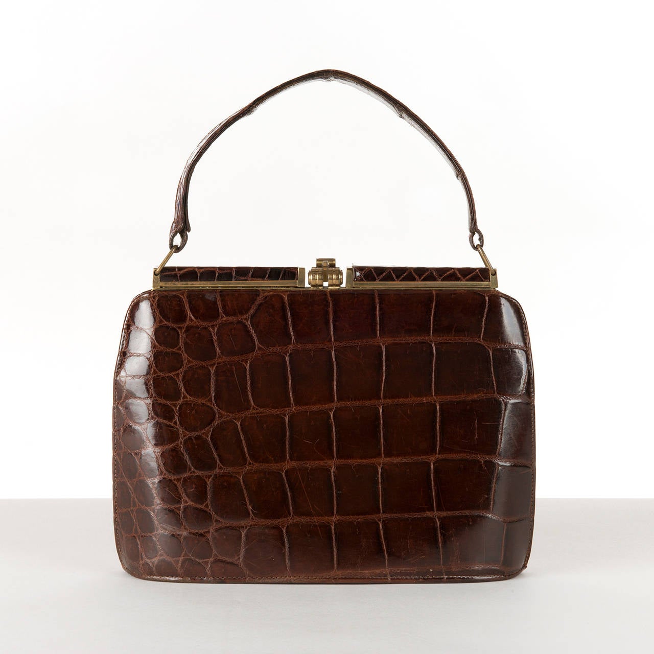 brown crocodile purse