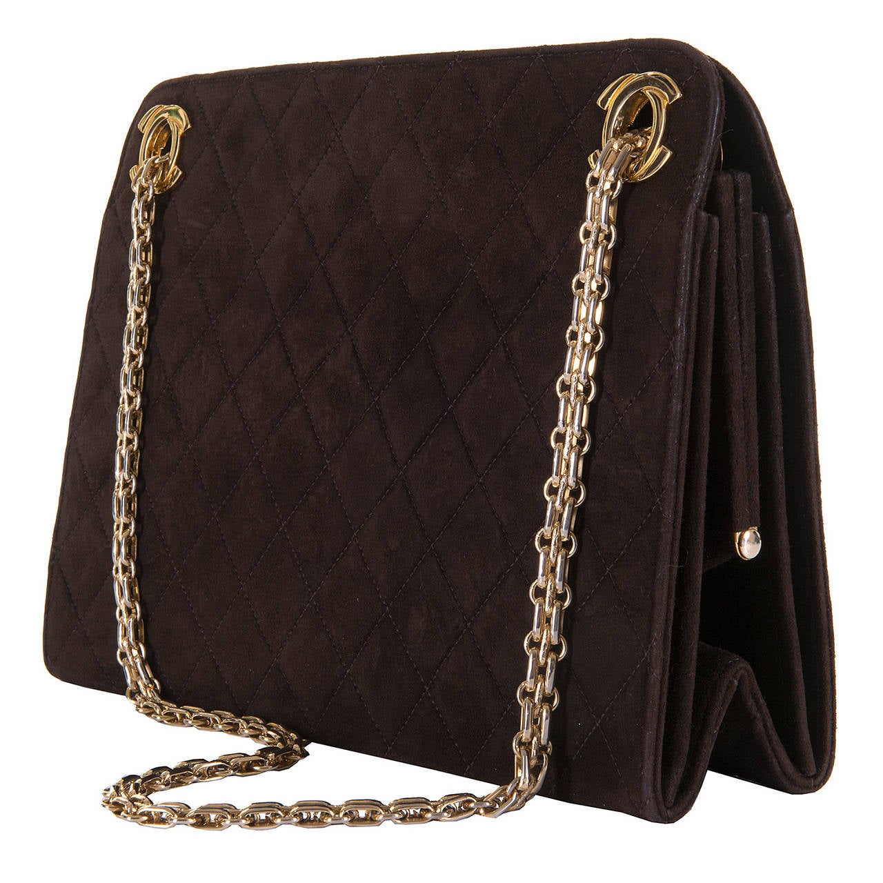 This fabulous Chanel Quilted Lambskin Suede Handbag in Chocolate Brown, with Gold-tone Hardware, comes with special order, double chain link straps,  and Iconic Chanel 'Double C' fittings. The bag's interior is finished in matching chocolate brown
