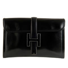 An Iconic Hermes Black Box Leather 'Jige' Clutch Bag