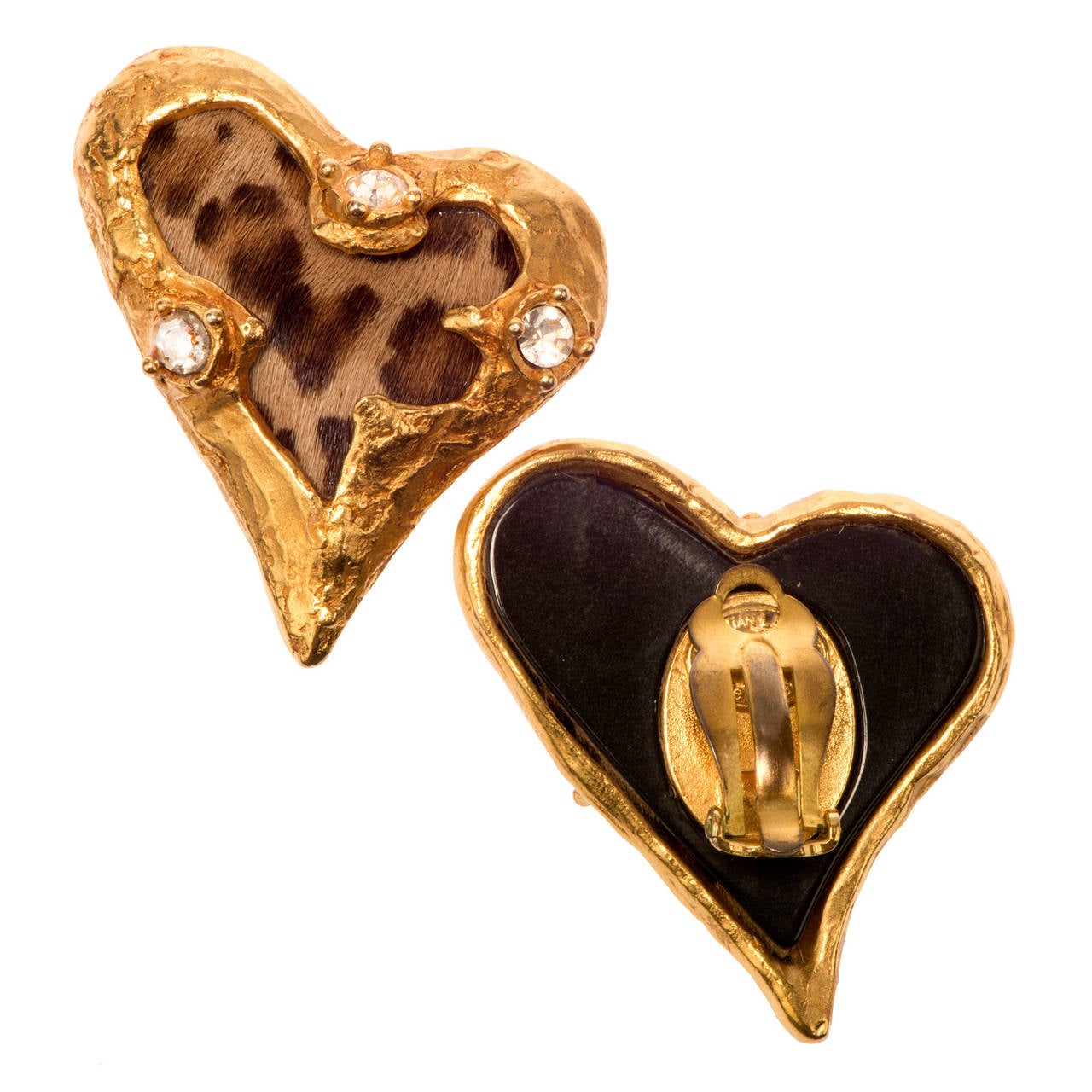 A sensational Pair of  Christian Lacroix, heart shaped, clip-on earrings. The textured gilt-metal frames, are inlaid with clear cut glass stones, which are inset with faux leopard fur. Stamped Christian Lacroix, made in France, centred with