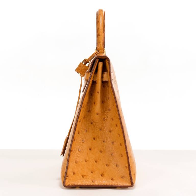 Women's Hermes 35cm 'Kelly' Handbag in Saffron Ostrich-Skin with Goldtone Fittings
