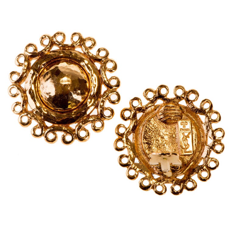 A delightful pair of hammered  gilt-metal 