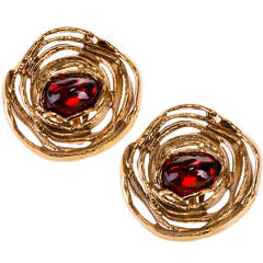 A pair of large earrings by Yves Saint laurent