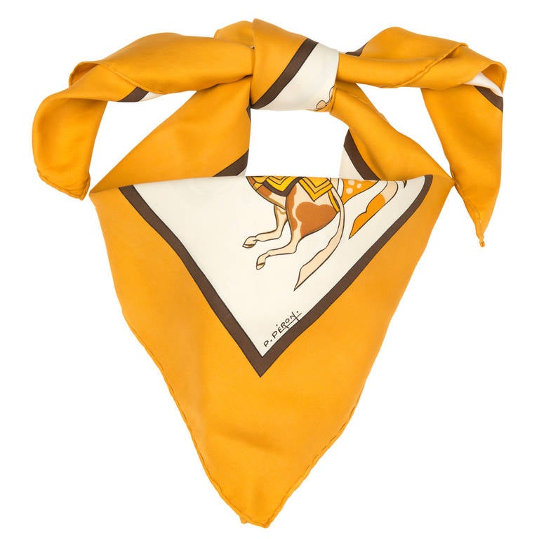 Beautiful muted colours are the hallmark of this fine vintage Hermes printed silk scarf. 'Artaban', designed & signed by P.Peron is a stand-out accessory.