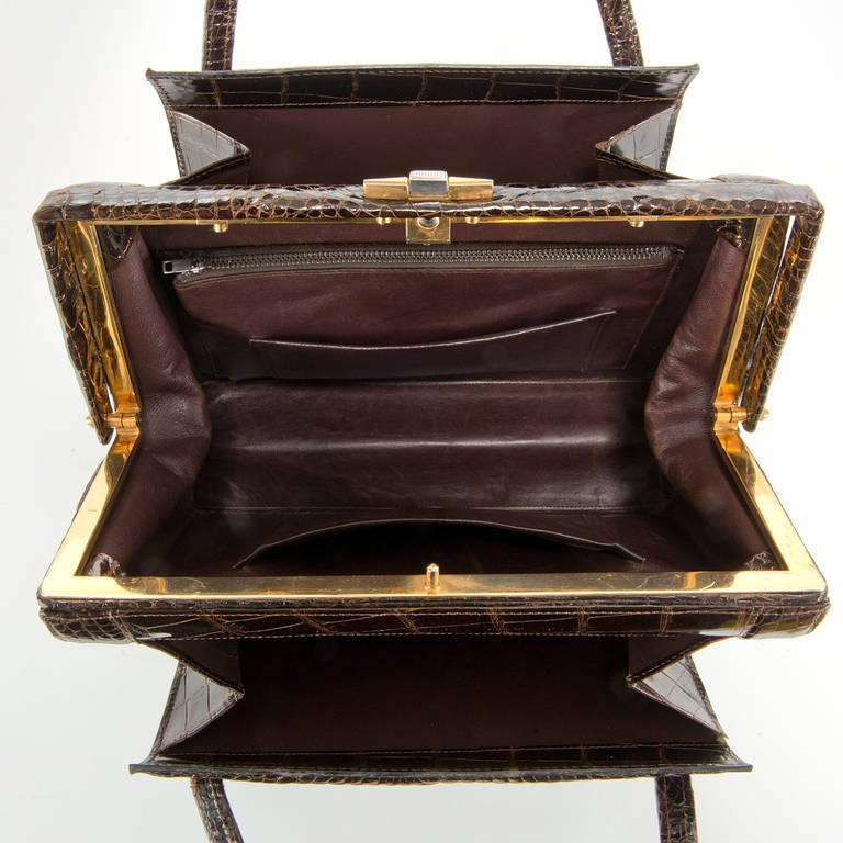 A Rare Chocolate Brown 'Porosus' Crocodile Handbag by Asprey, London 1