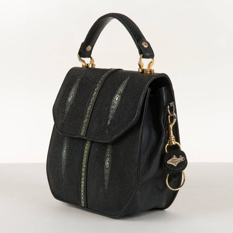 The natural 'Shagreen' colour-tone markings of the Stingray have been carefully selected and used to contrast with the larger textured black areas of the Stingray, making a really unique and gorgeous bag. This very rare bag is in great condition,