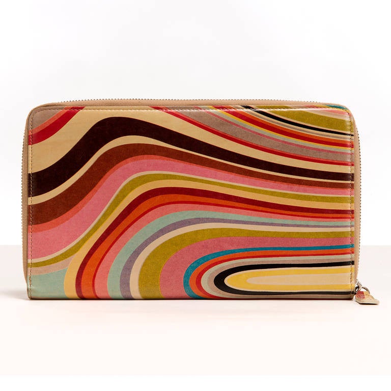 An iconic signature design by Paul Smith. It can be used as a Clutch bag or Wallet but either way it will add 