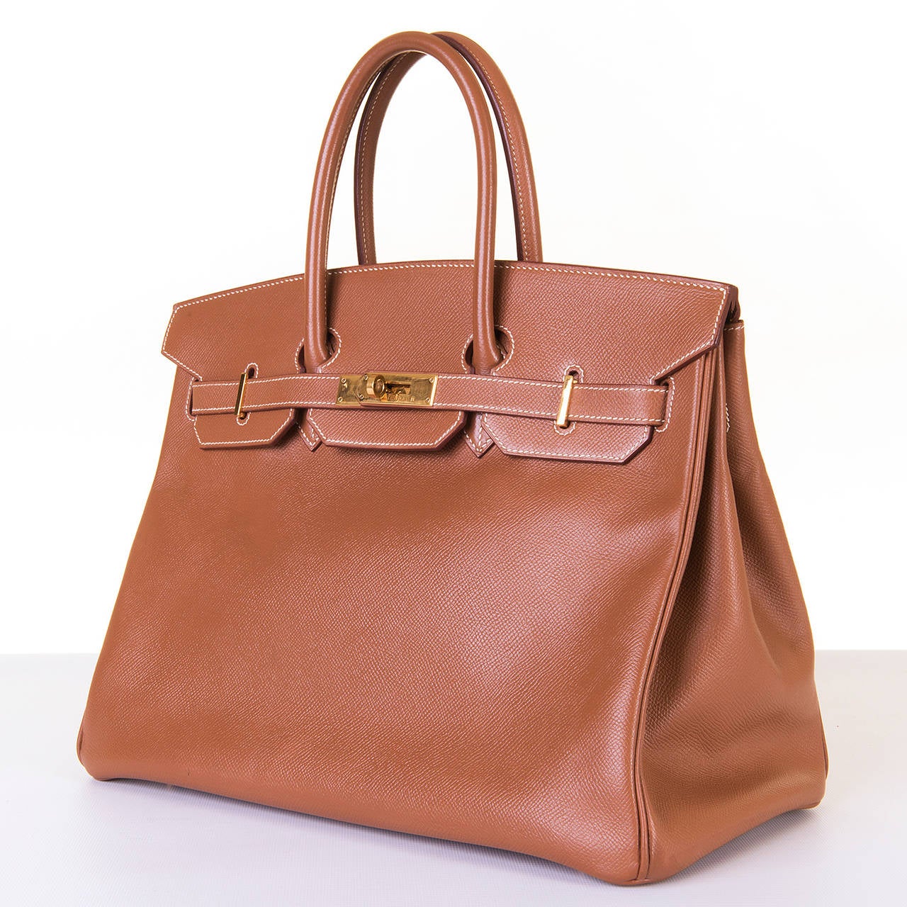 This classic, iconic, coveted, Hermes Birkin Bag, is finished in 'Sable' Epsom Leather. The bag is in excellent 