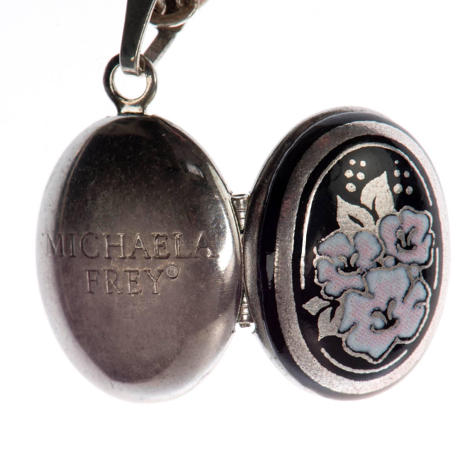 This beautiful locket, with it's fancy-link chain is a rare piece from the important 'Michaela Frey' workshops in Austria. Michaela Frey was retained by Hermes to design & manufacture all their enamel work jewellery, and to this day still produces